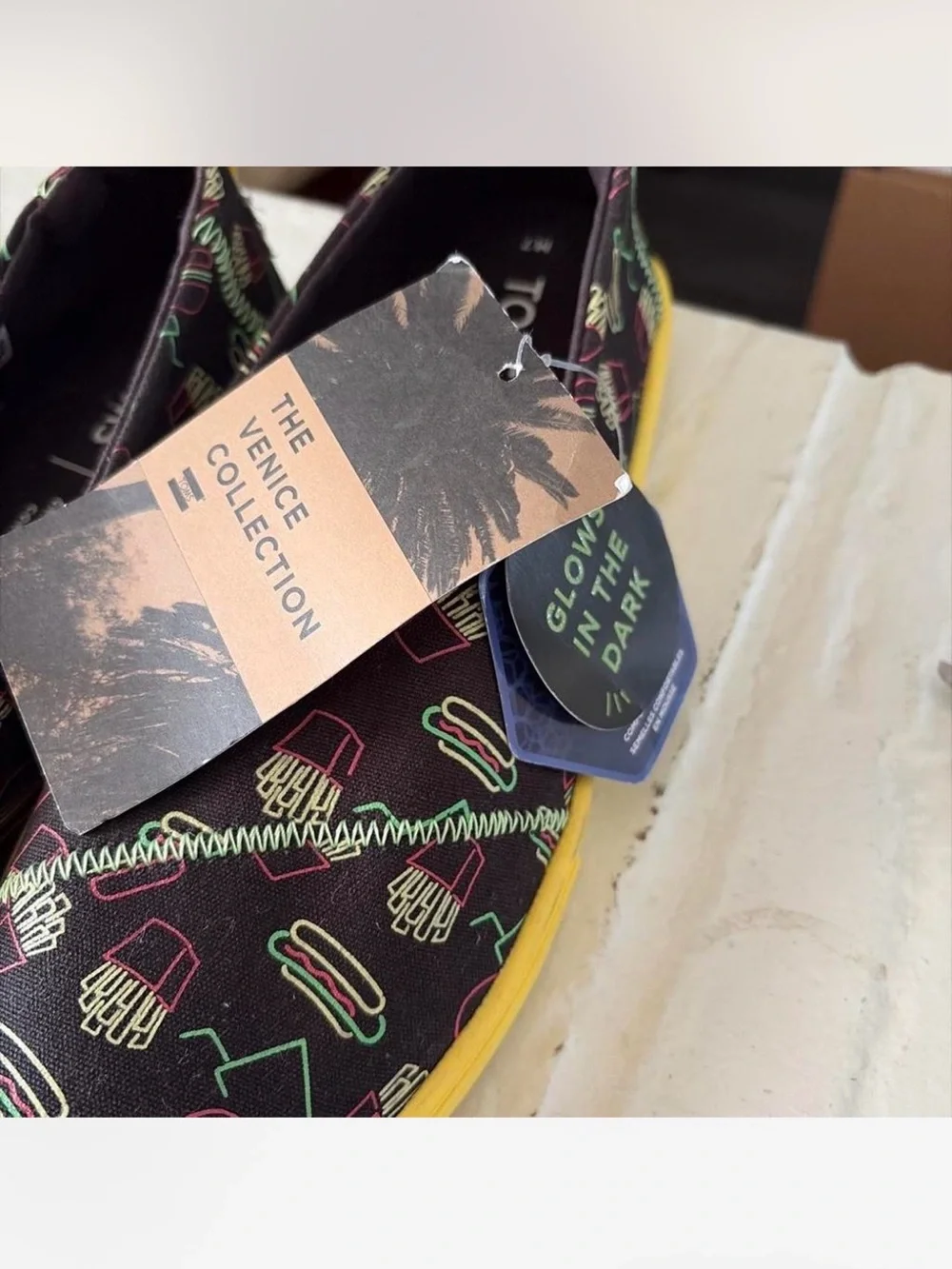 TOMS Black Slip-On Sneakers with Neon Diner Print and Yellow Sole